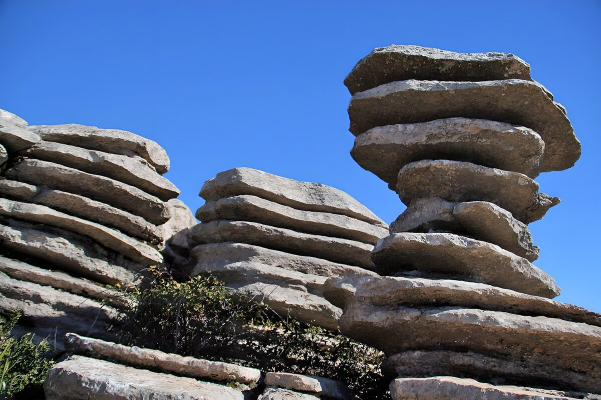 OCUK71307: Balanced Stones Under Clear Sky