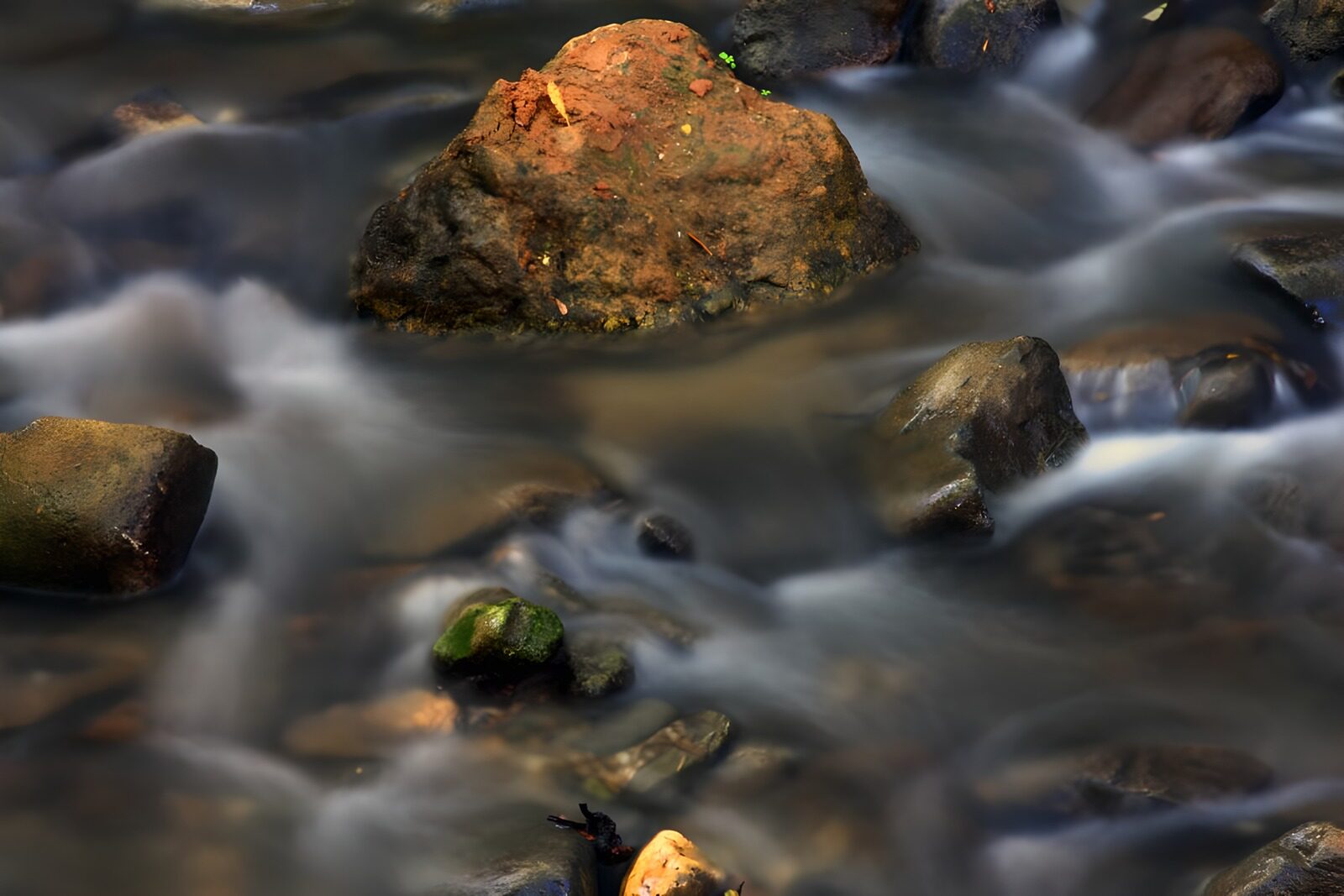 OCUK59885: Tranquil Stream Flowing Over Rocks