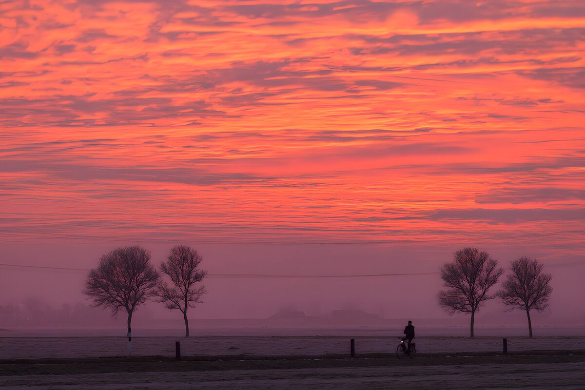 OCUK97874: Serene Sunset Over Calm Fields