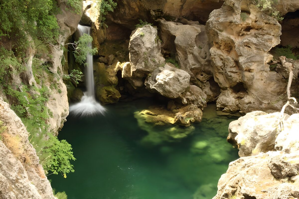 OCUK51868: Tranquil Waterfall in Hidden Cove