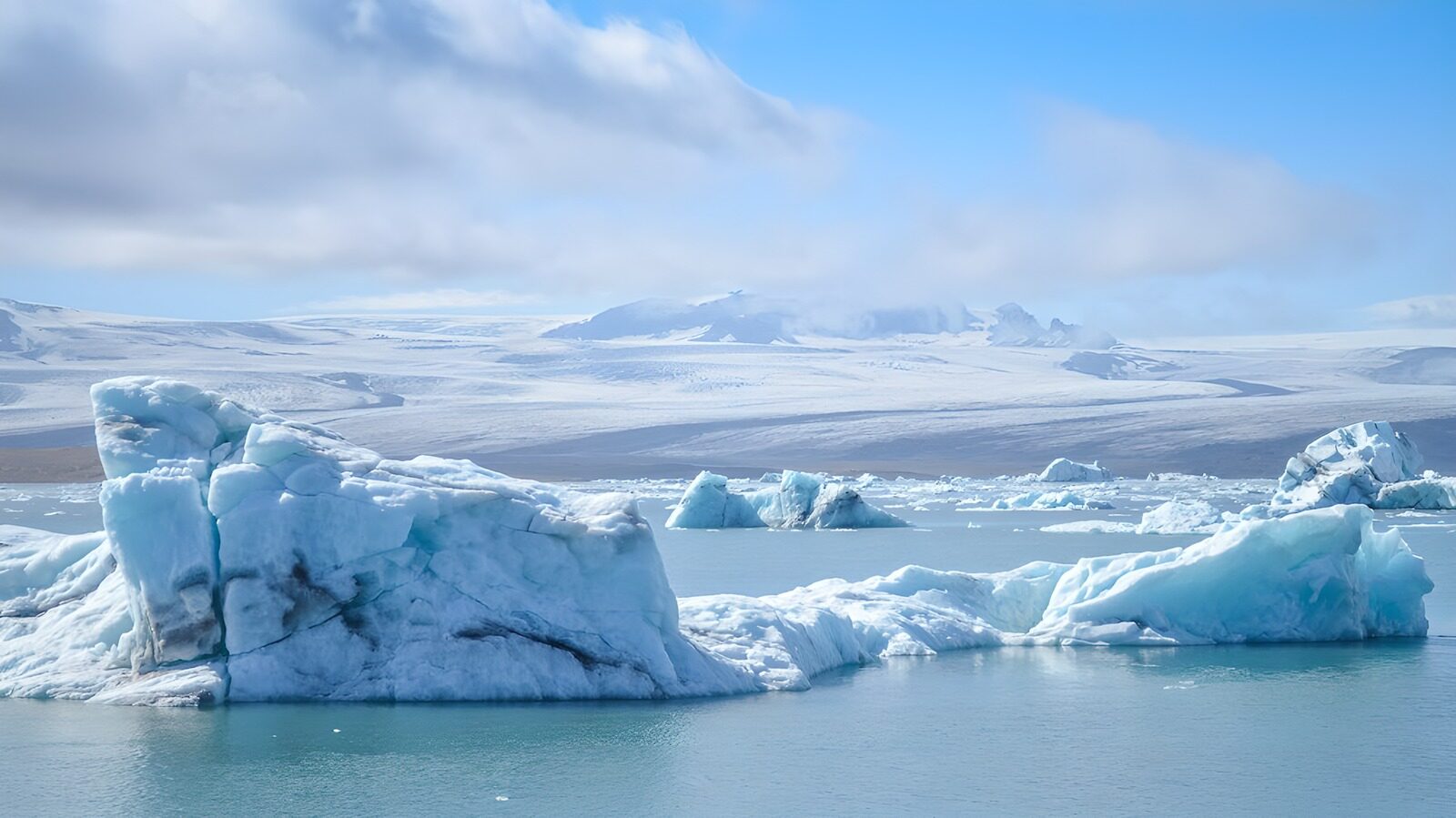 OCUK62069: Majestic Icebergs in Calm Waters