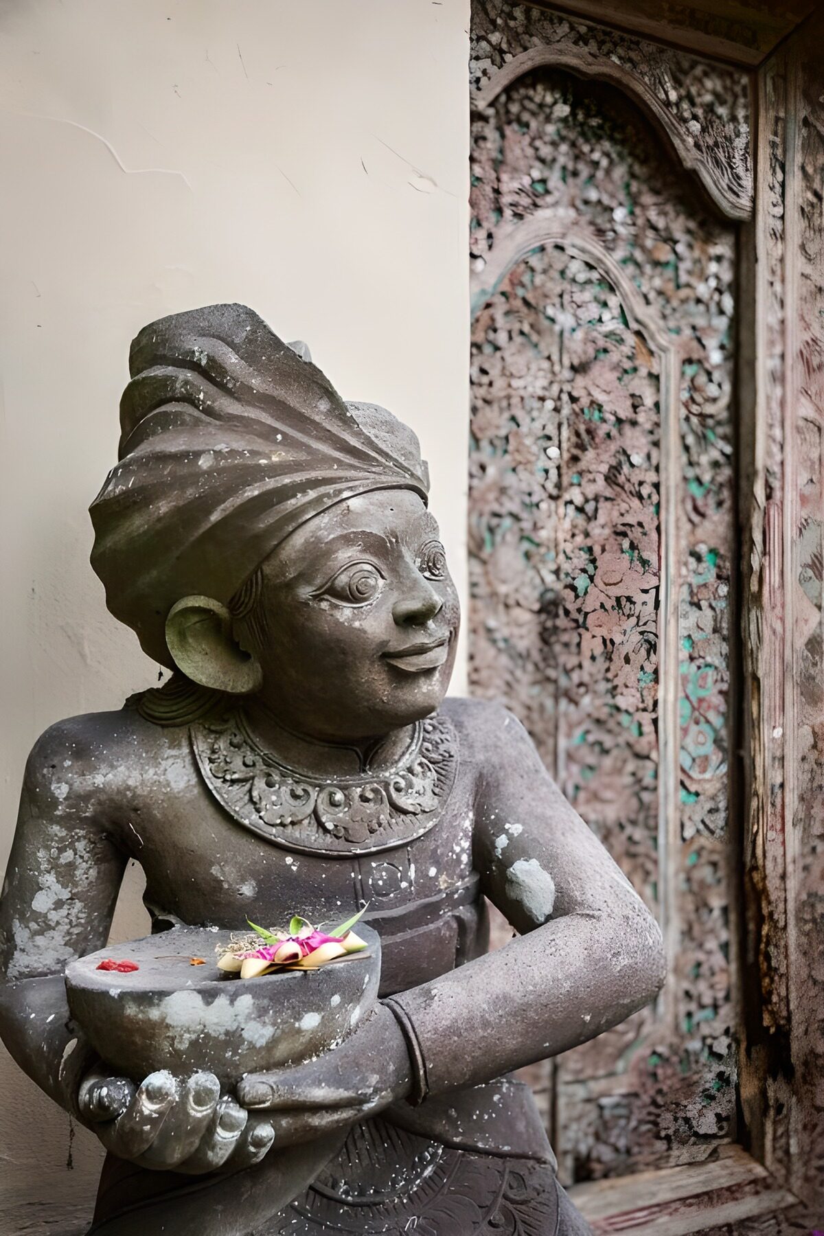 Stone Artisan with Floral Offering