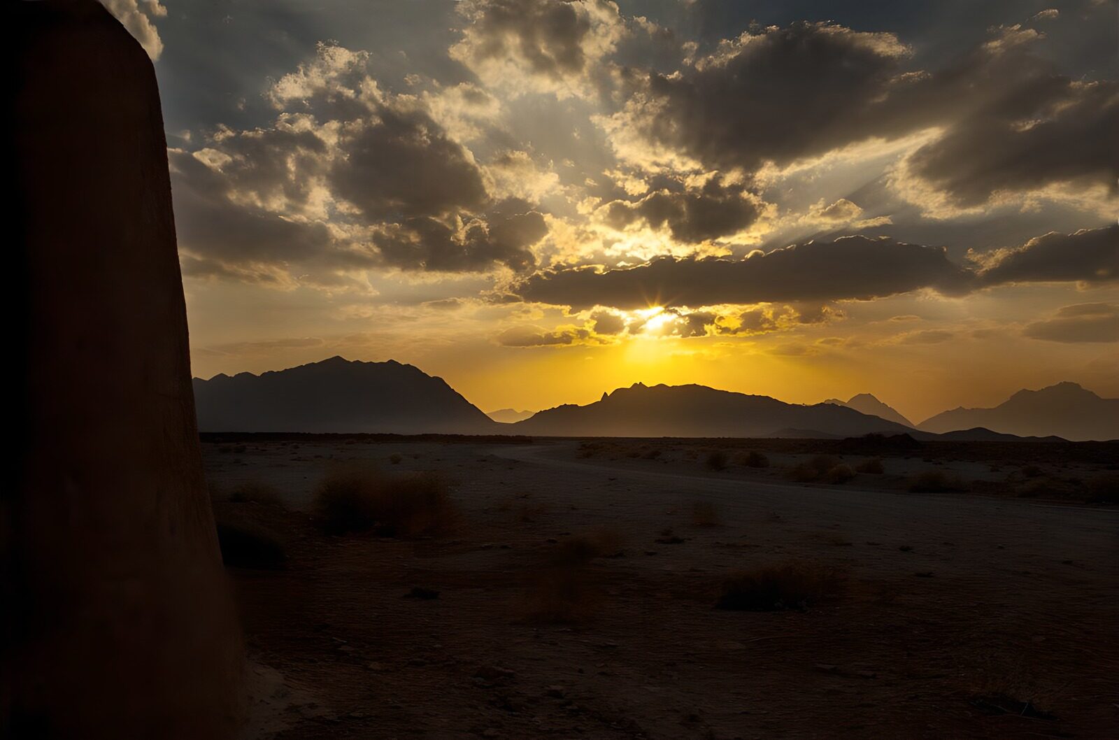 OCUK42116: Sunset Over the Desert Landscape