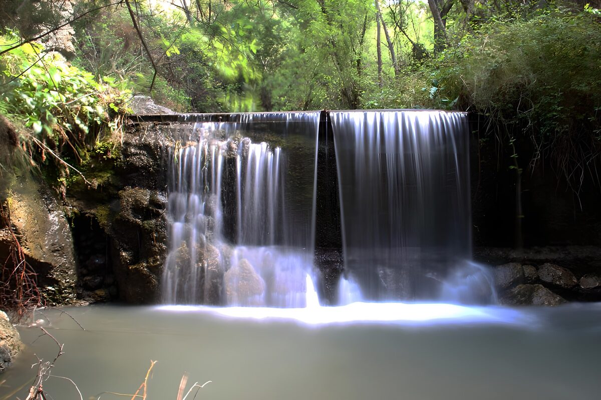 OCUK59496: Serene Waterfall in the Woods