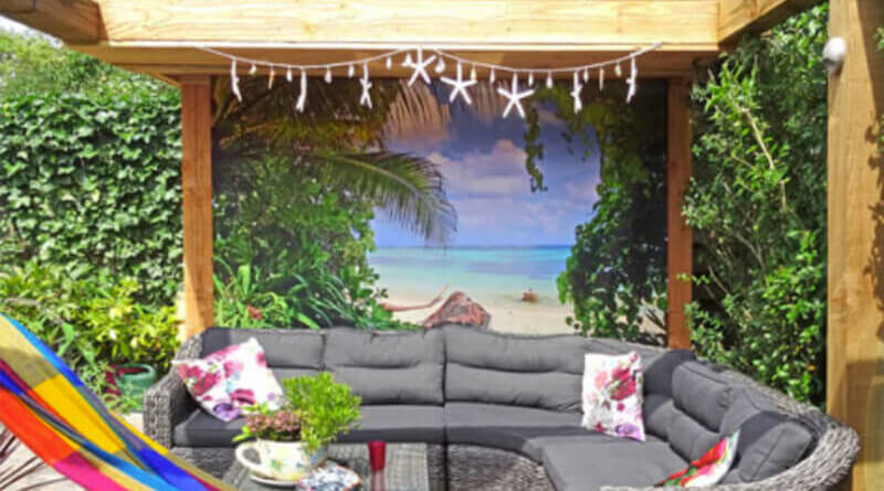 A seating area with a covered wall